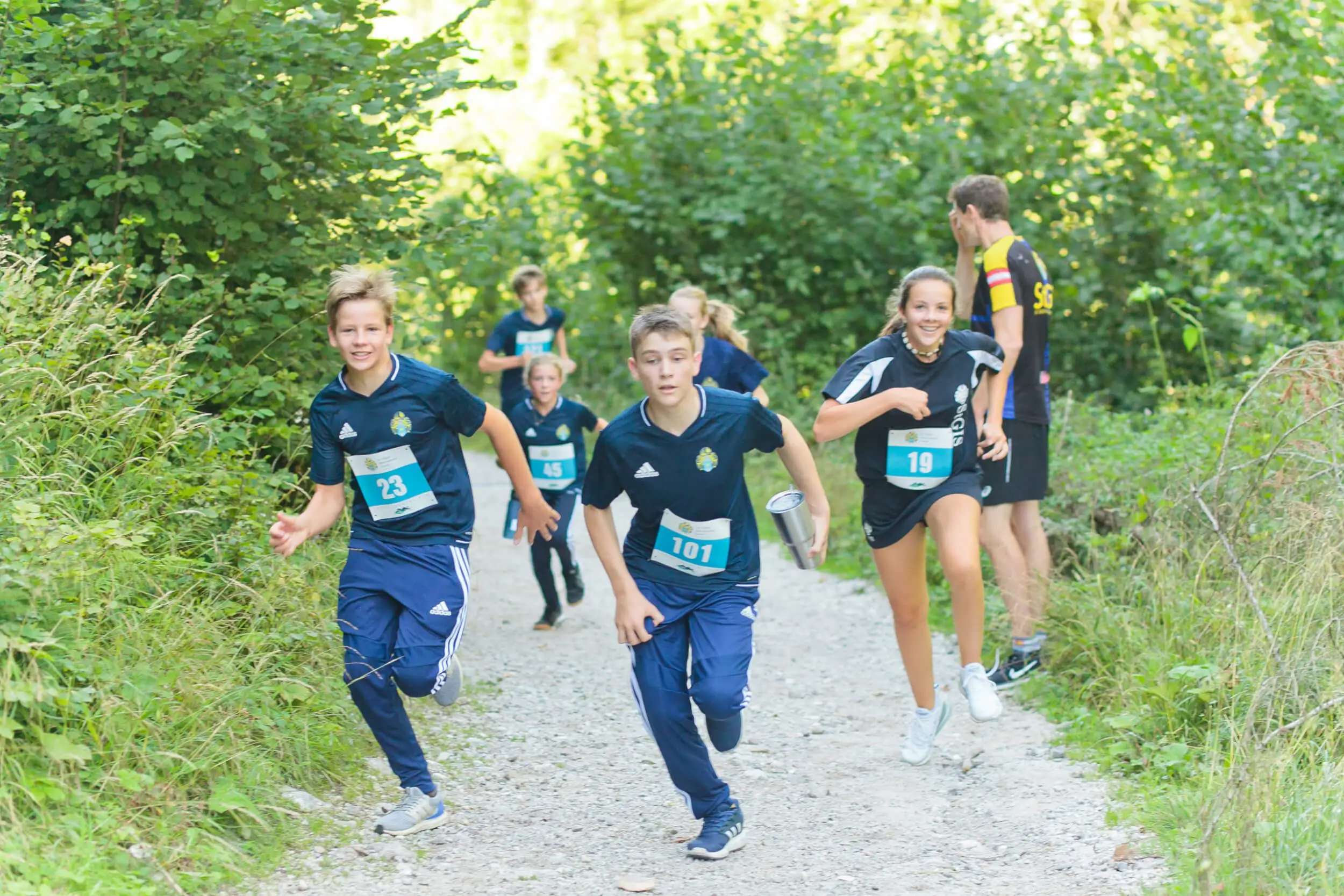 Students running in the Bell Race at St. Gilgen International Day and Boarding School