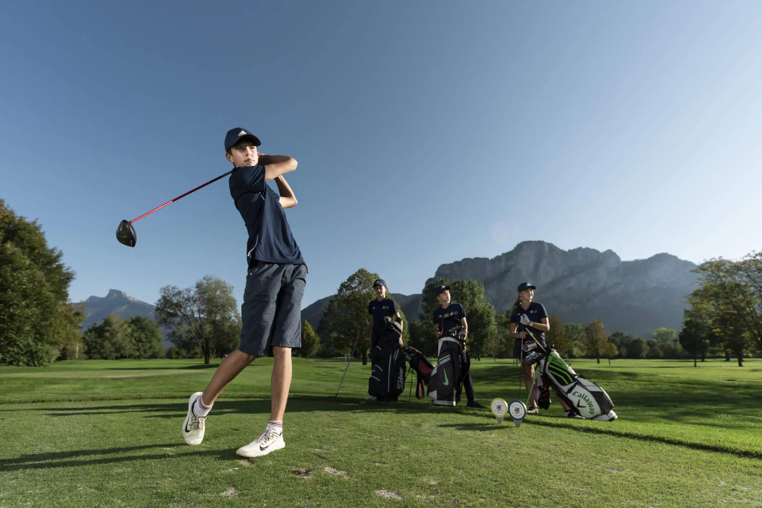 Students participating in a golf activity at St. Gilgen International Day and Boarding School