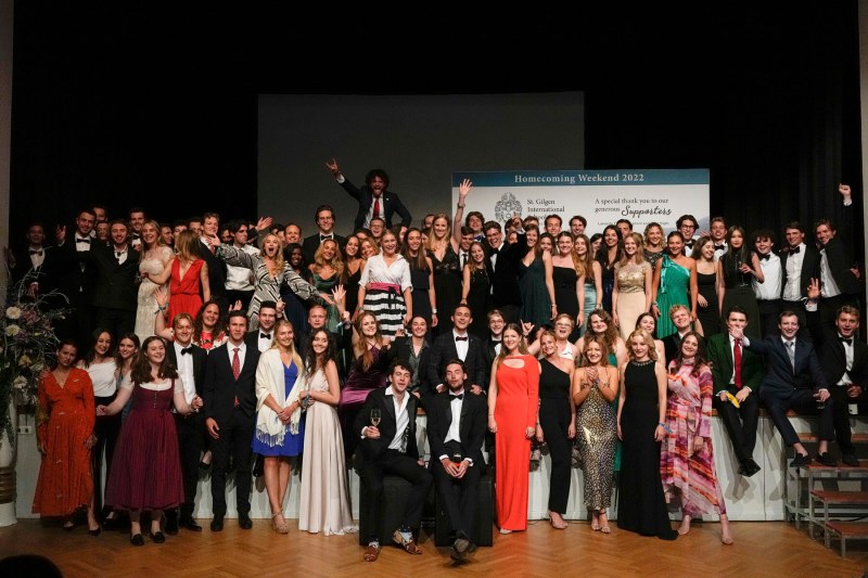 Group photo at the homecoming family dinner at St. Gilgen International Boarding School